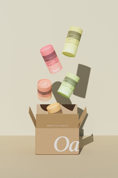 A minimalist studio shot featuring multiple wellness drink canisters floating above an open shipping box against a neutral, warm background.